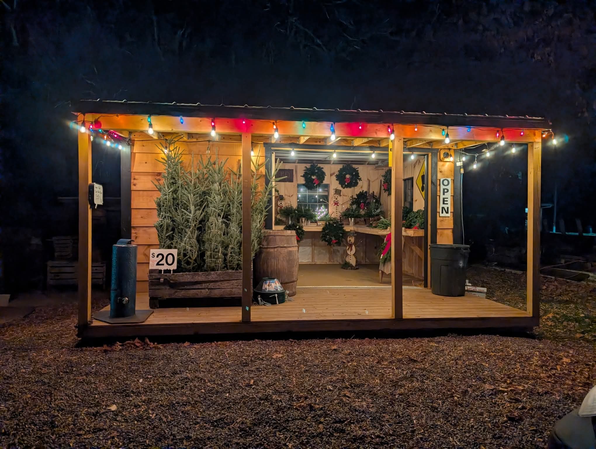 A Lakeview shed custom built for a produce stand in Darien, NY. This shed features a 6x12 insulated storage room on the left-hand side, cooled with a window AC unit for produce storage. The right side functions as a walk in produce stand, with white pine walls and electric.